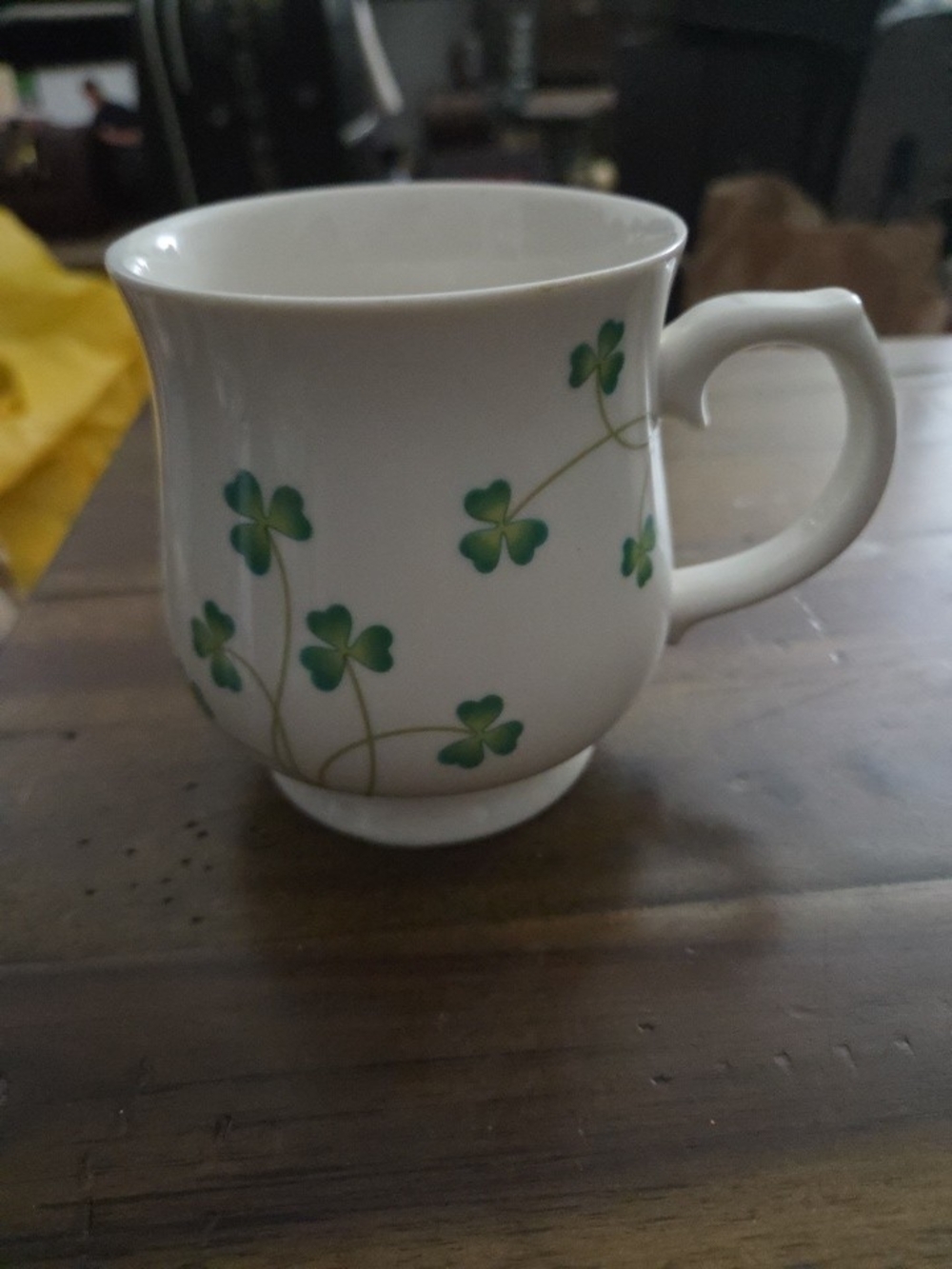 White Ceramic Mug with Green Clover Design